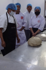 And here is the dough, rising...the new students are making a nutritious dough full of iron and vitamins to help boost the children's health