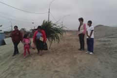 walking back to school with R - lady carrying animal food