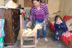 Sumni's mum with Choclo ready to make tamales and humitas