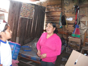 Mayorit and Mirella's house - the straw roof fell in onto the bed