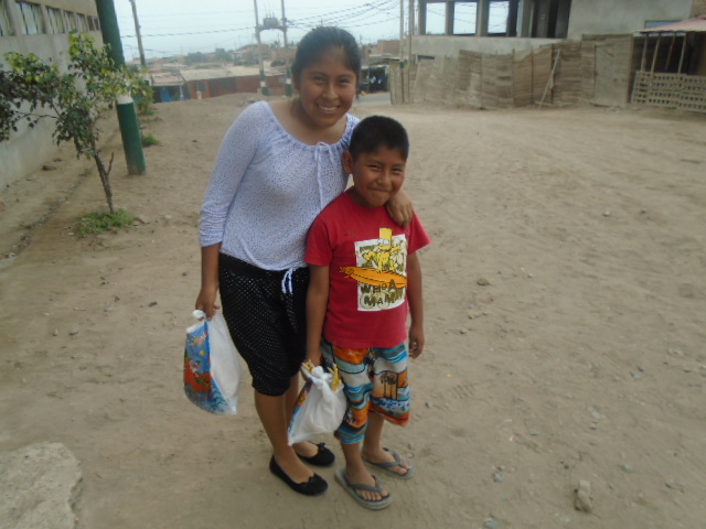 Maricielo & Frank leaving with their chickens